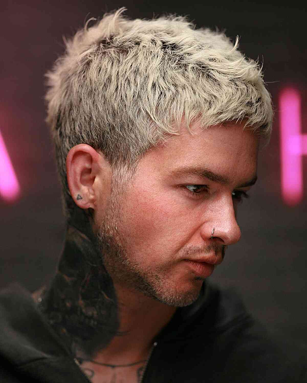 Bleached short crop with textured fringe and tight sides.