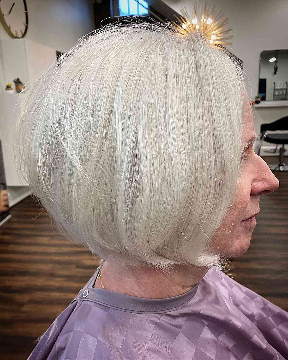White bob with a rounded outline and tucked-under ends.