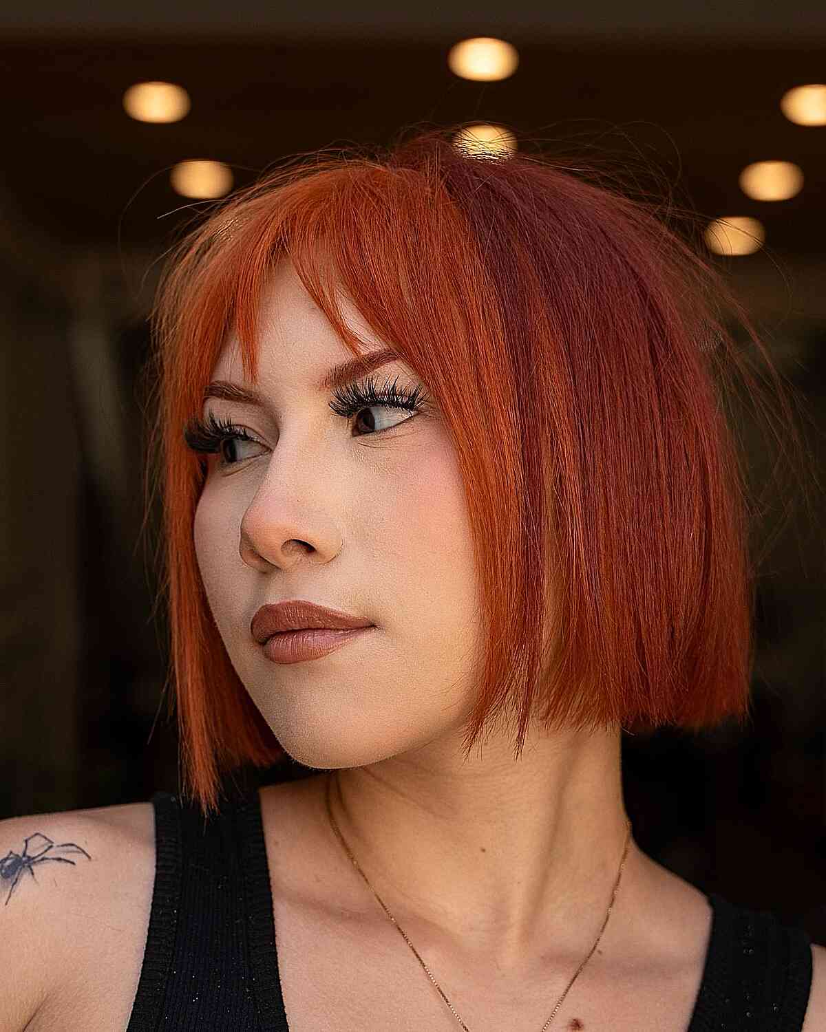 Jaw-length two-tone copper bob with a darker crown and brighter lengths.