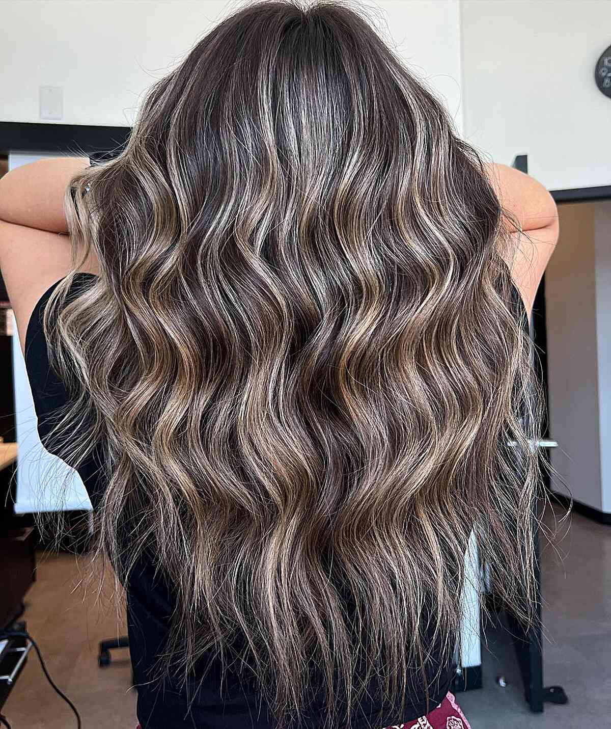 Long cool bronde waves with wispy textured ends.
