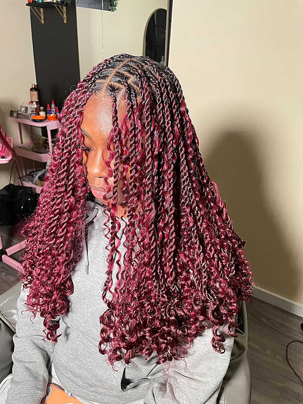 Medium burgundy knotless braids with crimped curly ends