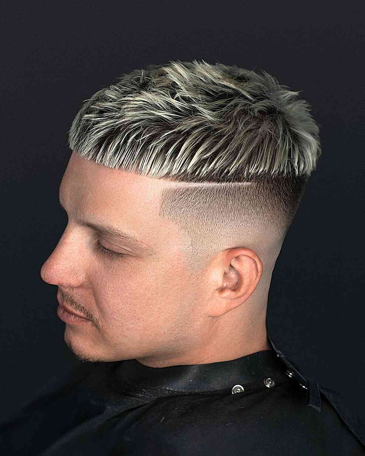 Blond top with sharp line design and faded sides