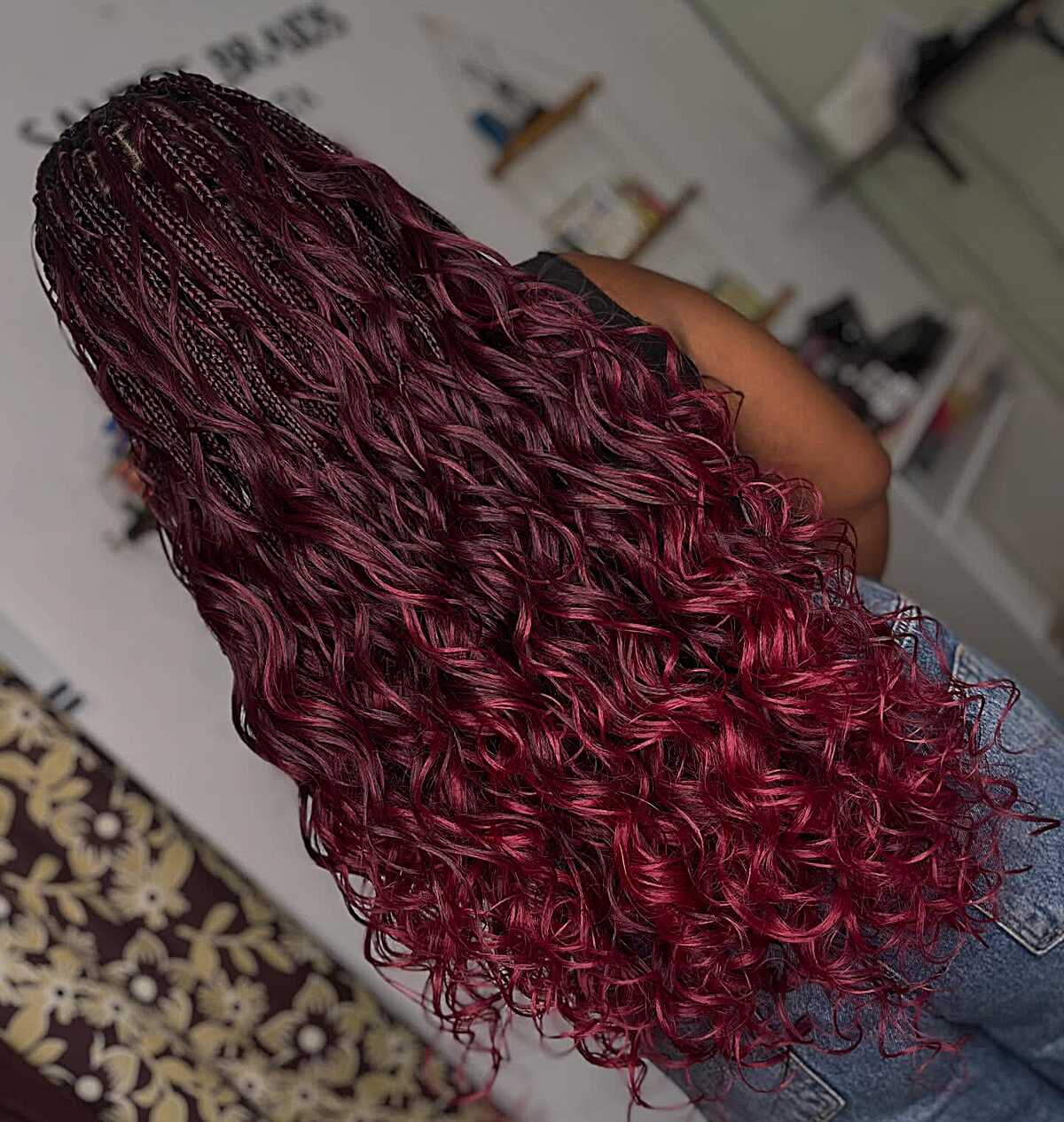 Micro burgundy braids with loose full-body waves