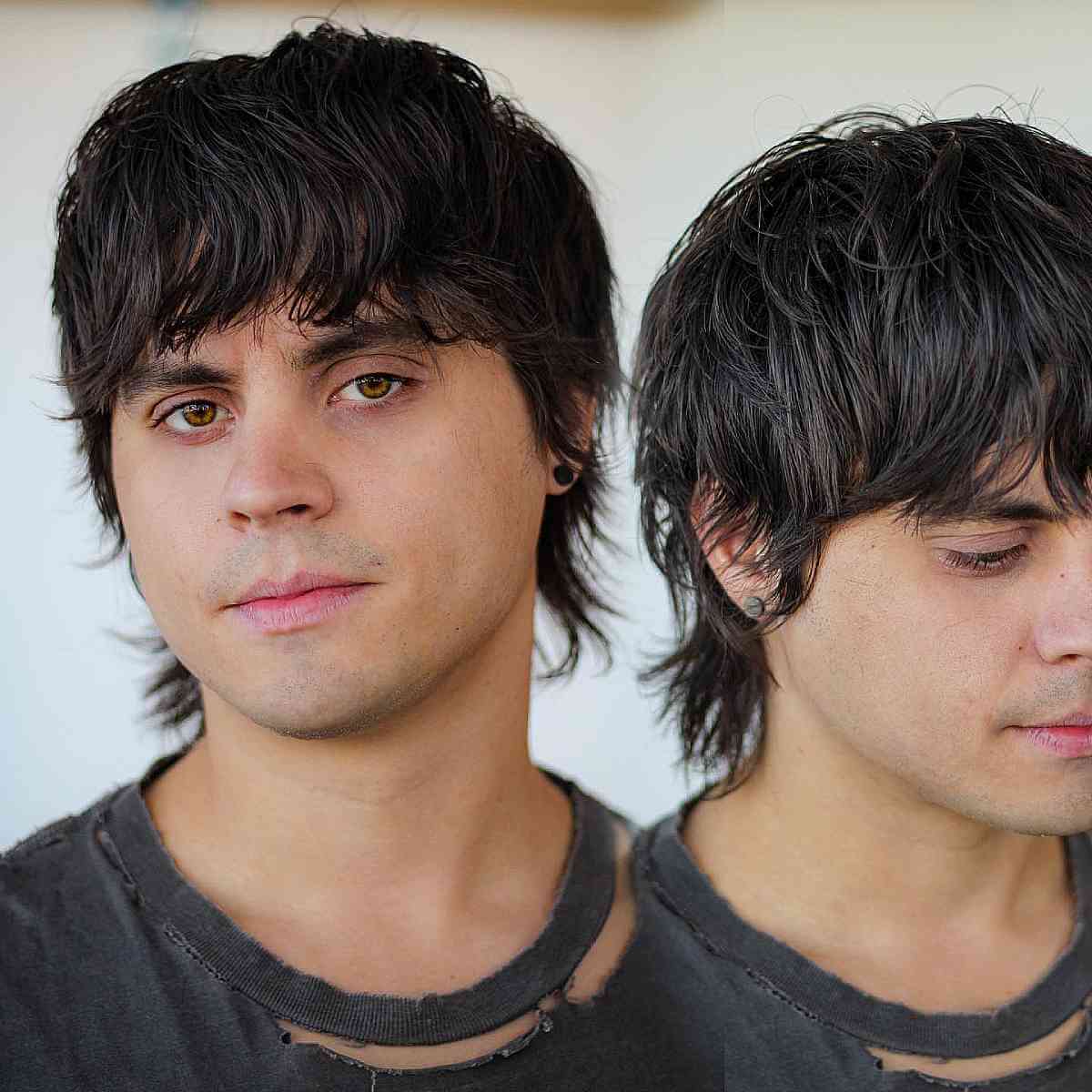 Short shag haircut with layered bangs and longer nape length.