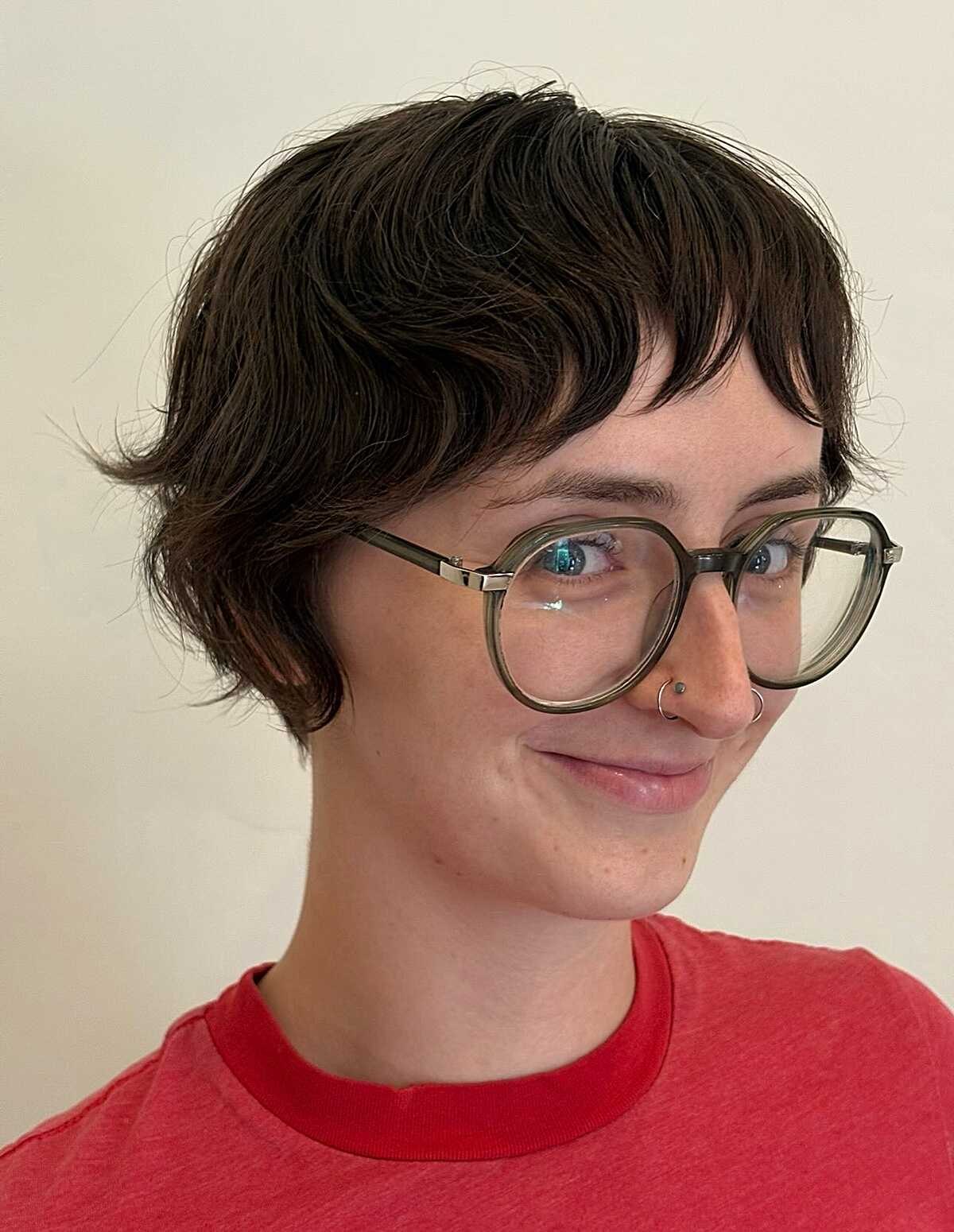 Cropped textured pixie bob with choppy bangs and short sides