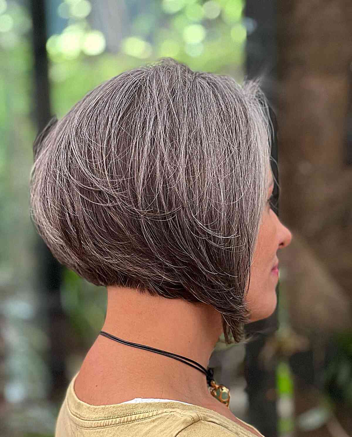 Stacked short silver pixie bob with tapered nape