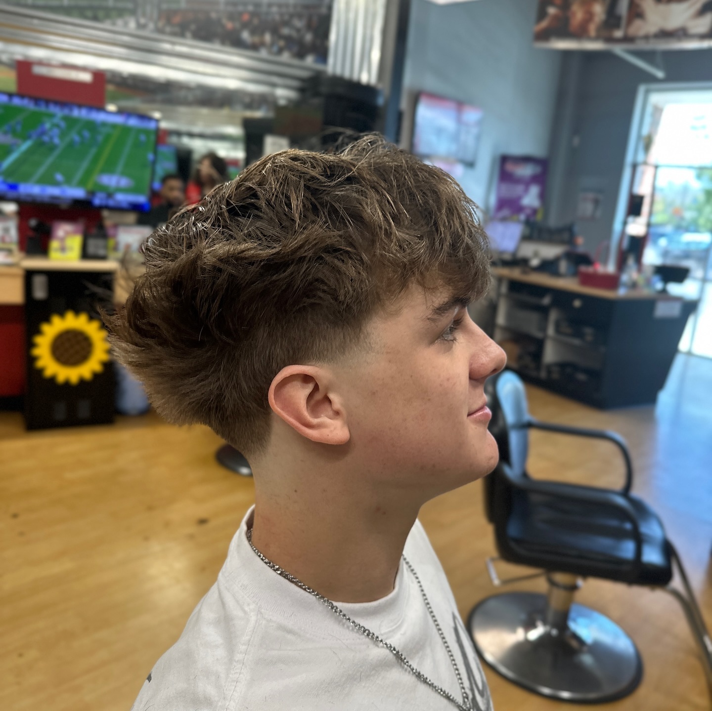 Soft wavy top with tapered sides and back.