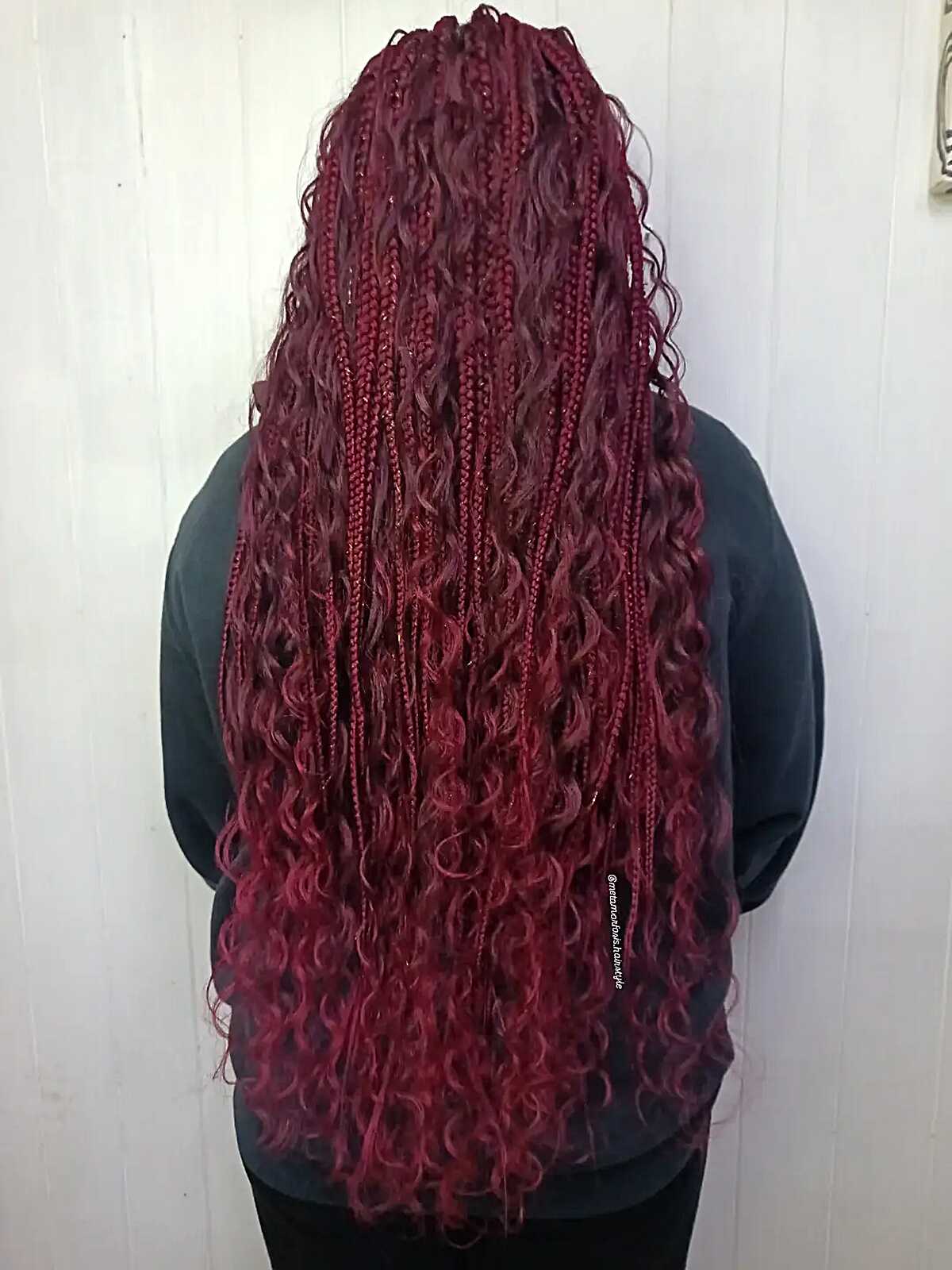 Long burgundy box braids with loose curly ringlets