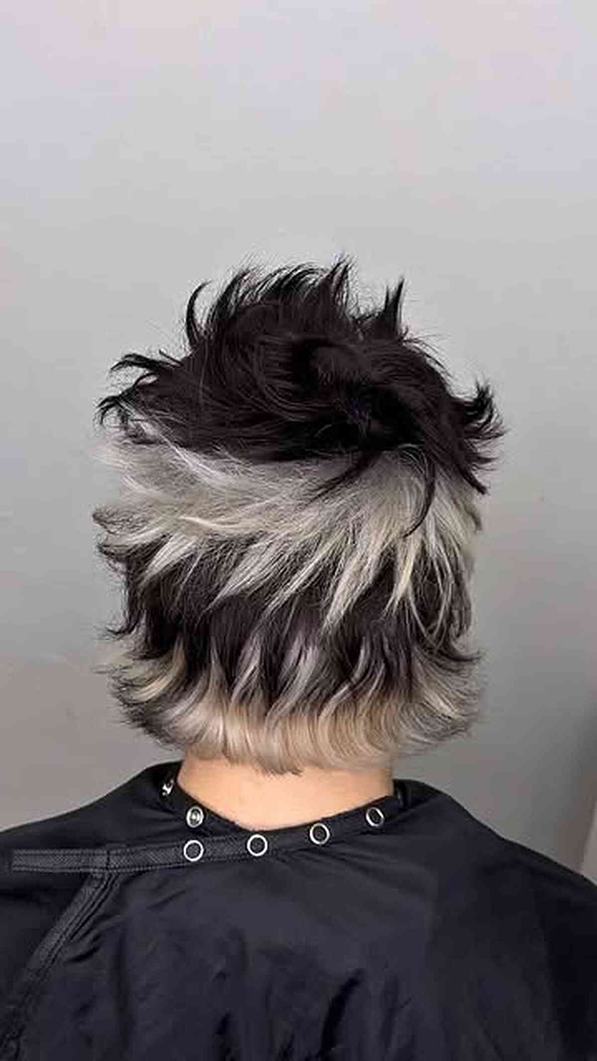 Layered dark and silver medium-length haircut