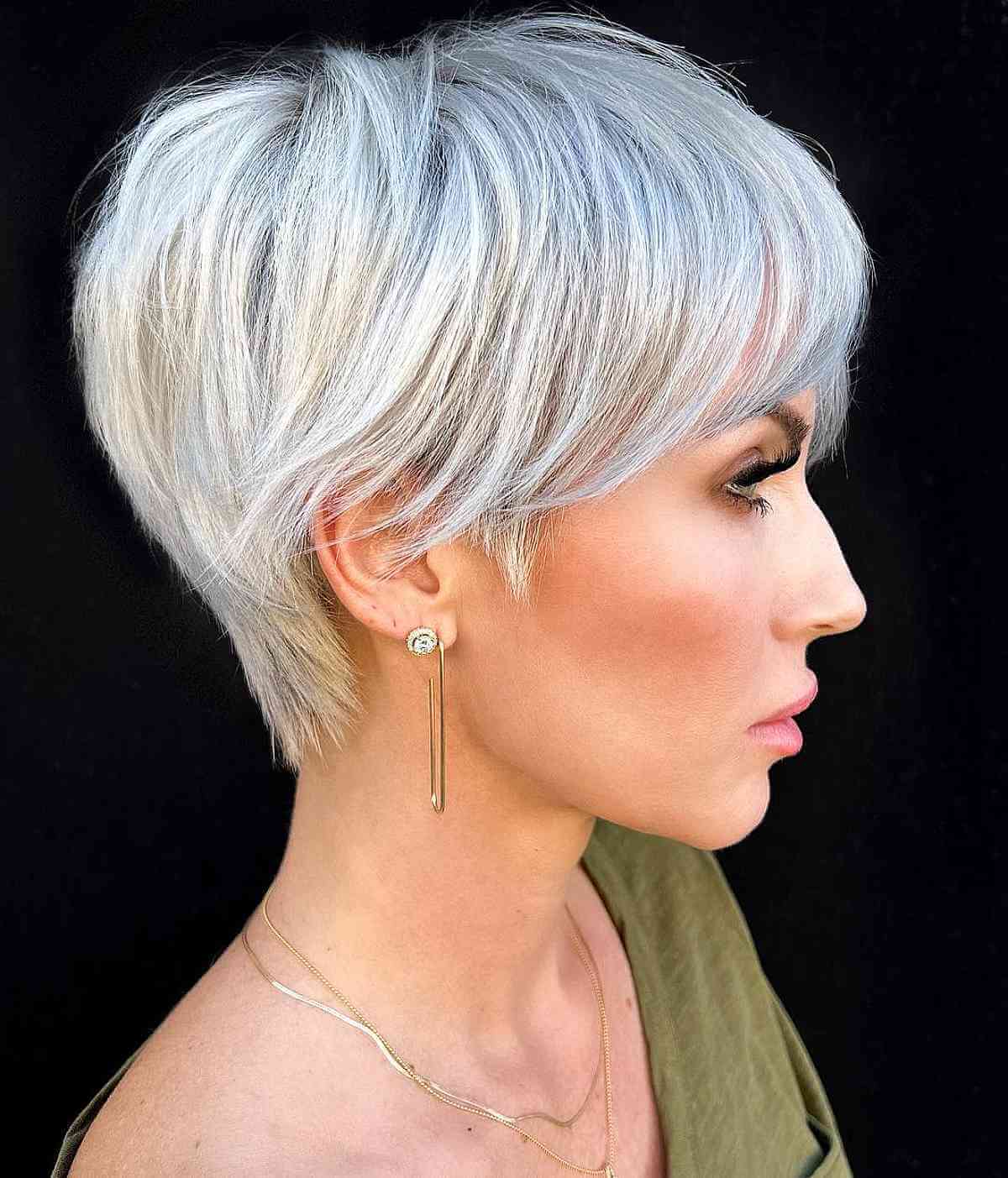 Rounded platinum bixie with soft fringe and tapered back.